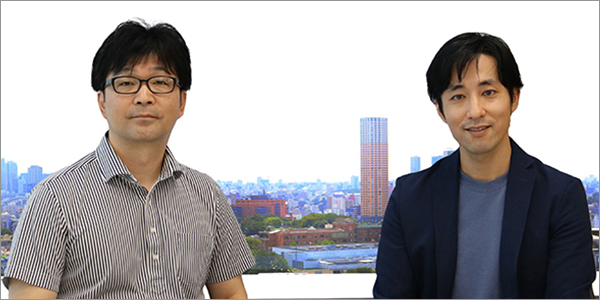 A photo of Matsunaga from JAE and Nakajima from Xenoma